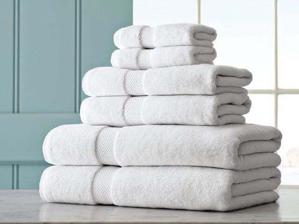 stack of white folded towels
